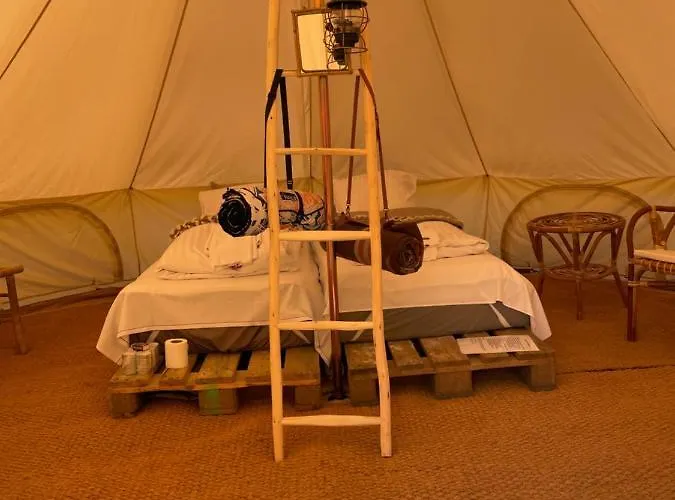 Mellem-rummet Guesthouse&glamping *